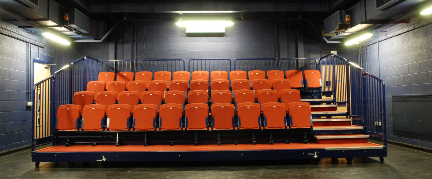 The raked seating of the Alec Clegg Studio taken from the centre of the stage. Steps to the right of the image with 52 seats in the rake.
